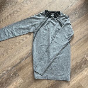 Perfect condition, sold out new jaanuu underscrub top xs